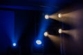 Theatre lighting equipment. The light rays from the spotlight through theatrical smoke Royalty Free Stock Photo