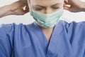 Theatre Nurse Adjusting Mask