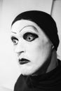 Theatrical actor with dark mime makeup