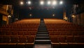 Theatrical interior with a stage and rows of comfortable seats Royalty Free Stock Photo