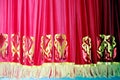 Theatrical red velvet curtain with gold pattern background Royalty Free Stock Photo