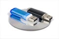 The theft of classified information: a small CD-ROM, 2 USB sticks, isolated on white Royalty Free Stock Photo