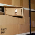 Theft of a sanitizer in a warehouse during a lockdown. Empty warehouse with opened boxes of medical disinfectants