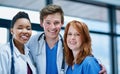 Their confidence inspires their patients confidence. Portrait of a team of confident young doctors working in a hospital Royalty Free Stock Photo