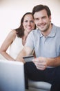 Their finances are in good shape. Portrait of a young couple doing their banking online. Royalty Free Stock Photo