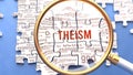 Theism and related ideas on a puzzle pieces. A metaphor showing complexity of Theism analyzed with a help of a magnifying glass Royalty Free Stock Photo