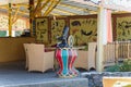 Thematic cafe exterior with Africa tribal pictures and statues