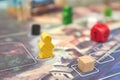 Themed Board games. colorful play figures with dice on Board. vertical view of the Board game close-up Royalty Free Stock Photo