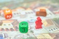 Themed Board games. colorful play figures with dice on Board. vertical view of the Board game close-up Royalty Free Stock Photo