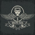 Theme label with pistons and skulls with wings