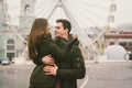 Theme love and holiday Valentines Day. pair of Caucasian heterosexual lovers in winter together gloomy weather embrace Royalty Free Stock Photo