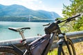 Theme of mountain biking in Scandinavia. human tourist in helmet and sportswear on bicycle in Norway on Hardanger Bridge Royalty Free Stock Photo