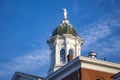 Themis with scales in her hand on the dome of a building in New England Royalty Free Stock Photo