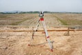Survey equipment, a theodolite at a construction site. Geodetic total station.
