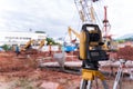 Theodolite equipment of Surveyor builder engineer during surveying work in construction site