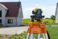 Theodolite on tripod on yard Royalty Free Stock Photo