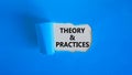 Theory and practice symbol. Words `Theory and practice` appearing behind torn blue paper. Beautiful blue background. Business,
