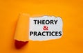 Theory and practice symbol. Words `Theory and practice` appearing behind torn orange paper. Beautiful orange background. Busines