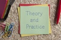 Theory and Practice written on a note