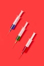 Therapeutic set of sterile plastic syrenges with colorful vaccines. Royalty Free Stock Photo