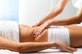Therapist doing curative belly massage on female patient. Royalty Free Stock Photo