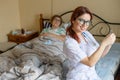 Therapist gives an intramuscular injection to an elderly woman. A nurse holds a syringe with medicine for a senior Royalty Free Stock Photo