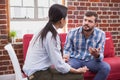 Therapist listening to her patient Royalty Free Stock Photo