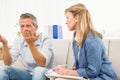 Therapist listening to male patients worries Royalty Free Stock Photo