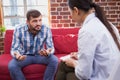 Therapist taking notes on her patient Royalty Free Stock Photo