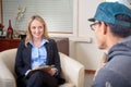 Therapist talking to patient Royalty Free Stock Photo