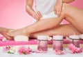 Therapist waxing customer's leg at spa Royalty Free Stock Photo