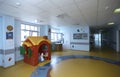 Therapy rehabilitation playroom for children: table, chairs, toys and rehabilitation equipment