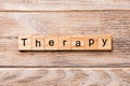 Therapy word written on wood block. therapy text on wooden table for your desing, concept Royalty Free Stock Photo