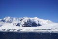 There is a big rock in the center of the iceberg.