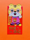 cute tiger on the red envelope with the word \