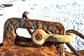 Anchor for rope on rusty nautical buoy Royalty Free Stock Photo