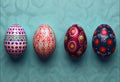 There are four Easter eggs on a blue background. Generated AI