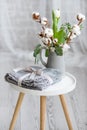 There is a gift on the white tabouret. Royalty Free Stock Photo