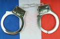 There are handcuffs on the flag of France.