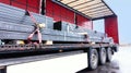 There is a loading to the truck trailer . fastening of freight in the trailer .