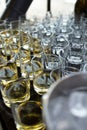 there are a lot of glass transparent glasses with drinks. poured drinks at the event Royalty Free Stock Photo