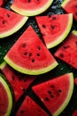 There are a lot of wet watermelon fruit pieces. Selective focus.