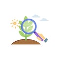 There is a magnify glass examining the plant Royalty Free Stock Photo