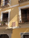 Toledo Balconies on Yellow House