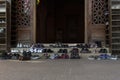 There are many shoes left on the steps at the entrance to the Nasir-ol-molk Mosque