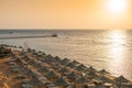 There are many of sun umbrellas and deck chairs on the beach. View of the Red Sea from a height.  Beautiful landscape of the sea Royalty Free Stock Photo