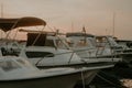 There are many yachts, boats and ships at sea. Marina at sunset Royalty Free Stock Photo