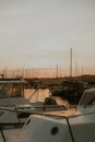 There are many yachts, boats and ships at sea. Marina at sunset Royalty Free Stock Photo