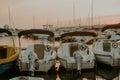 There are many yachts, boats and ships at sea. Marina at sunset Royalty Free Stock Photo