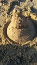 When there is no snow, you can dazzle a snowman from wet sand Royalty Free Stock Photo